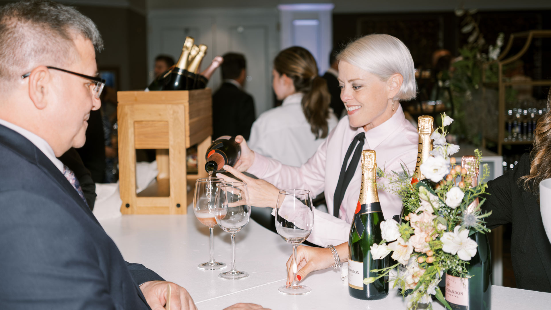 woman pouring glass of wine